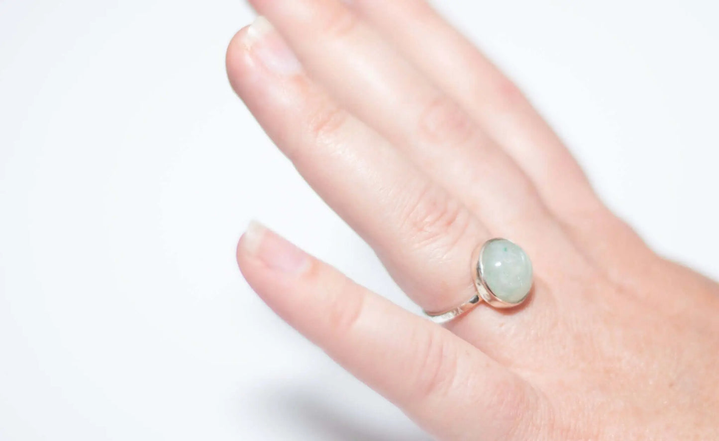Engraved Dude Mama Aventurine Ring showcased on a hand, featuring a beautiful aventurine stone.