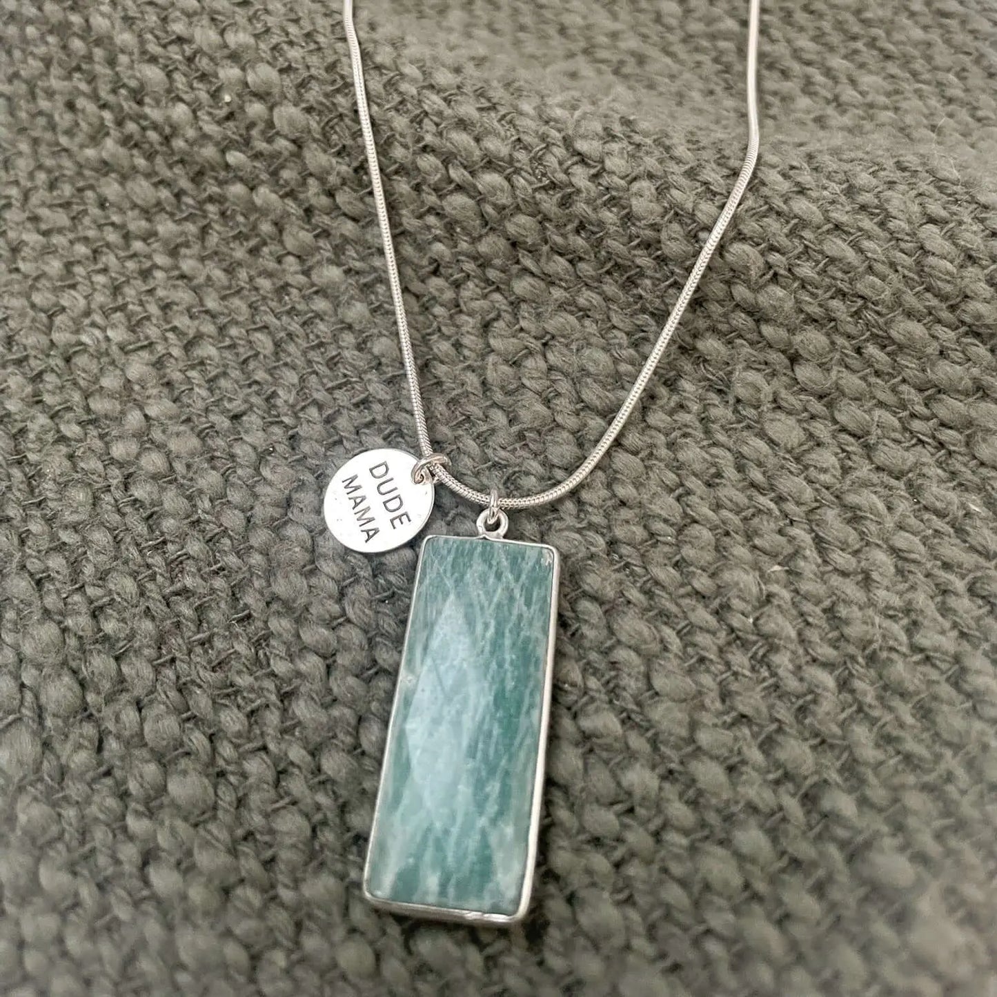 Engraved Dude Mama amazonite necklace, a meaningful baby shower gift with a calming blue-green hue.