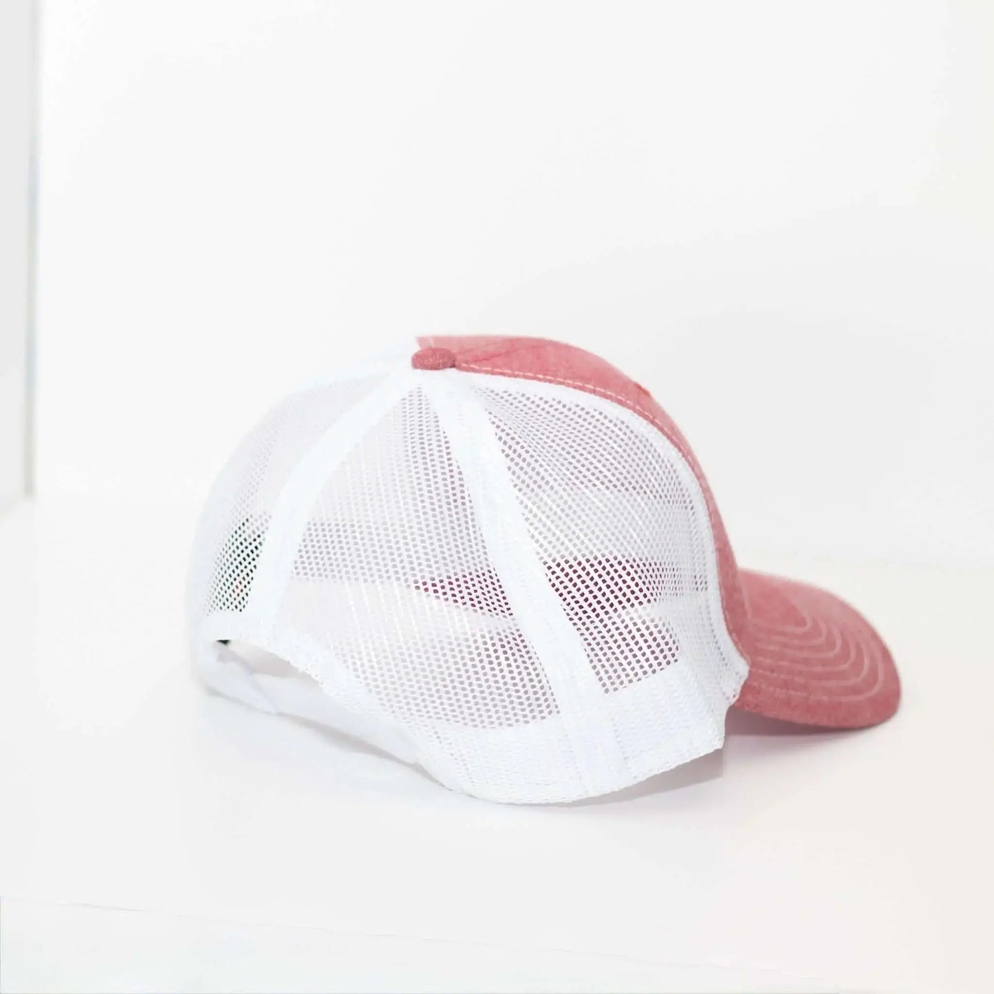 Light red and white Dude Mama hat showcasing its back view, perfect for proud boy moms wearing a boy mom hat.