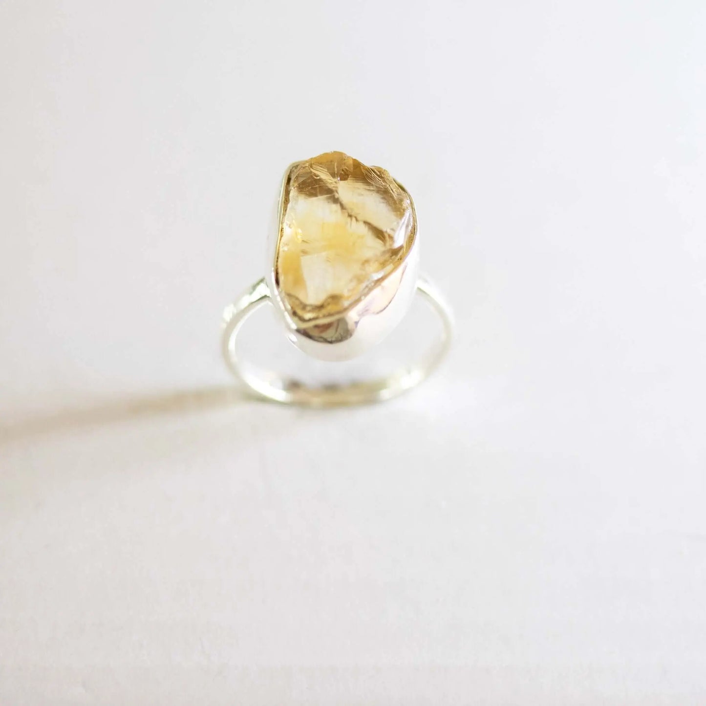 Engraved Dude Mama citrine ring, perfect as a baby shower gift, showcasing its golden glow.