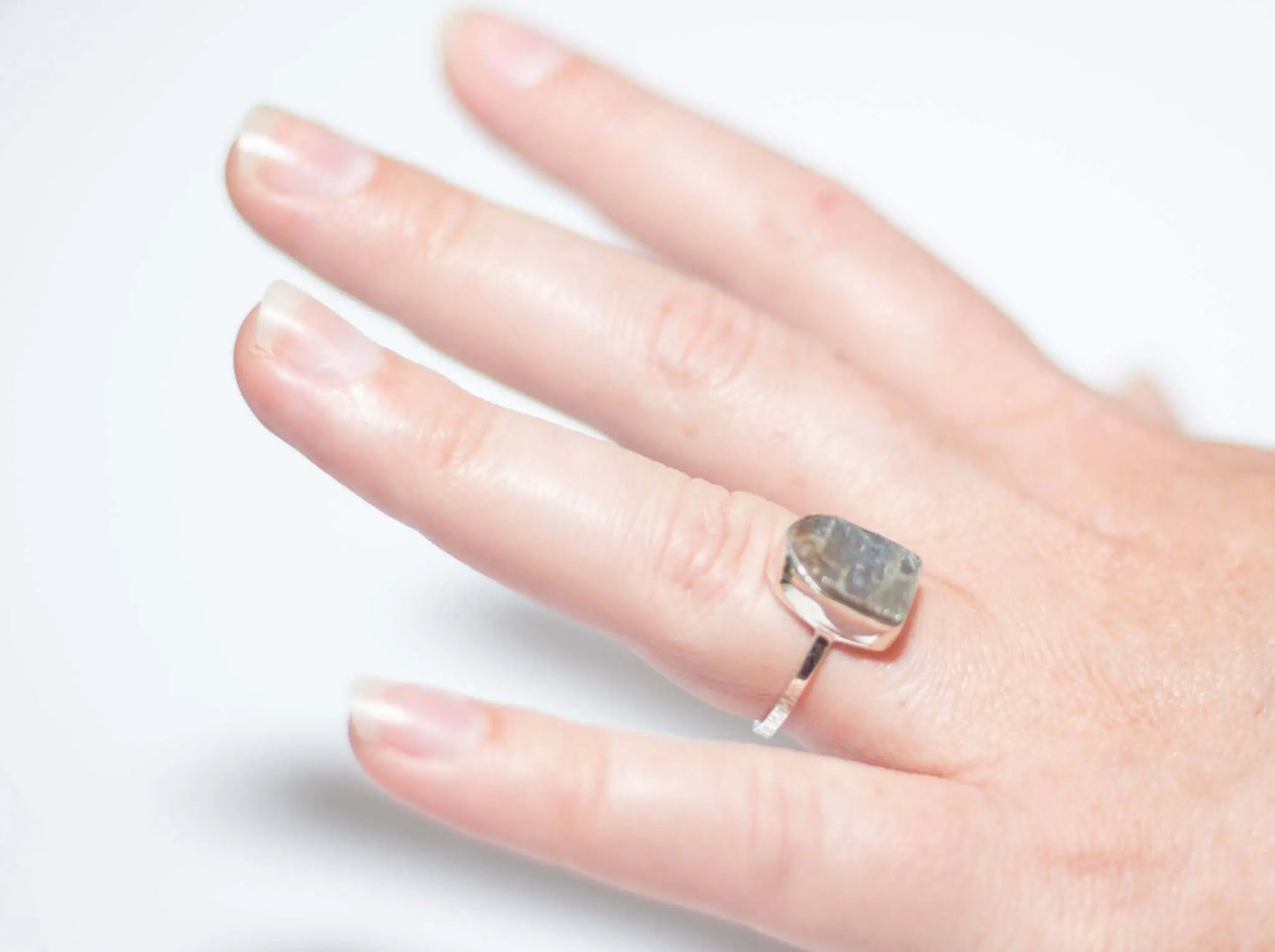 Engraved Dude Mama labradorite ring worn on hand, ideal baby shower gift for moms.
