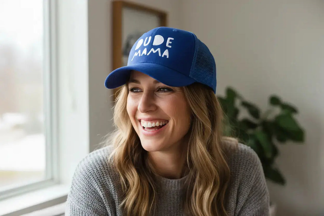 Woman wearing a blue boy mom hat - Dude Mama