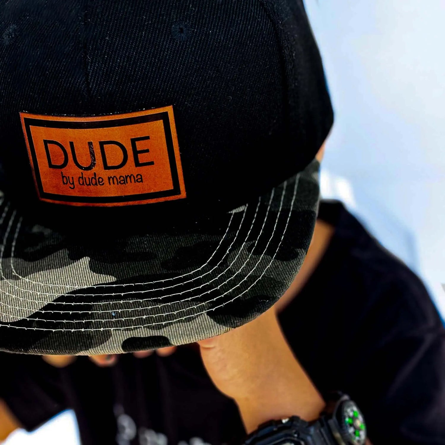 Dude hat with camo brim, perfect toddler hat for adventurous boys. Comfortable and stylish for kids.