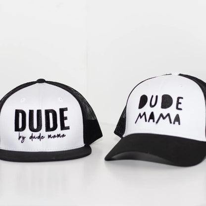 Black and white boy mom hat - the curved brim hat says 'Dude Mama'. There is a matching flat brim hat for son that says 'Dude'. It's a kids hat. This is a great mom and son matching outfit.
