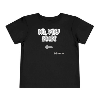 This is a picture of a boys graphic tee that says "No, You Rock" with an arrow pointing.