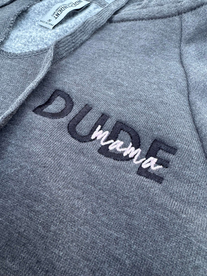 Close-up of the embroidered text on a dark gray Dude Mama sweatshirt, ideal for boy moms. Boy Mom Sweatshirt.