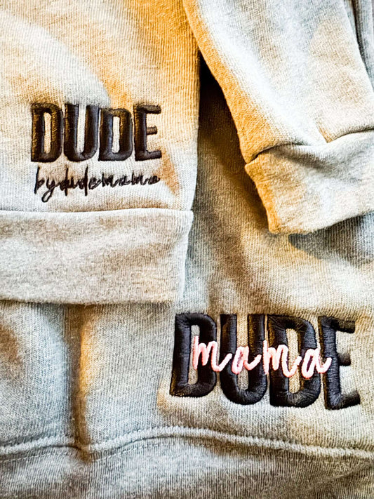 Mom and Son Matching Sweatshirts featuring 'Dude' and 'Dude Mama' embroidered on gray fabric.