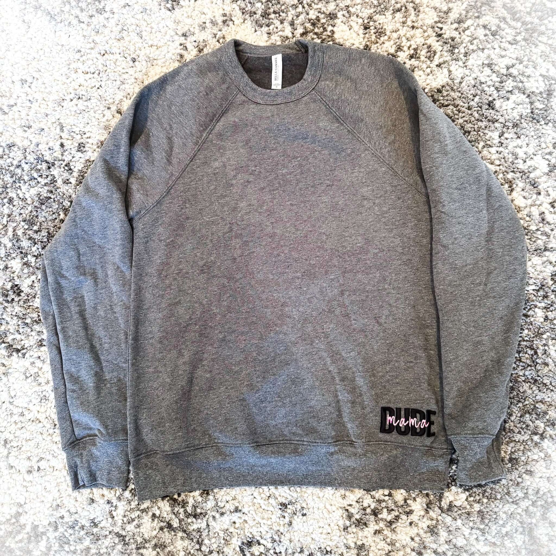 Gray Dude Mama Boy Mom Sweatshirt, a cozy and stylish choice for boy moms. Ideal for casual wear and comfort.