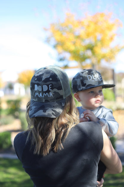 Mom and son wearing matching camo hats