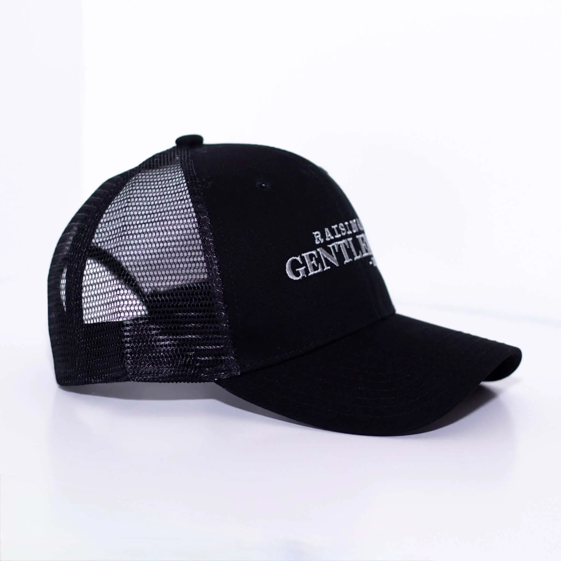 Raising a Gentleman - Boy Mom Hat in black with mesh back, perfect for moms raising boys. Side profile