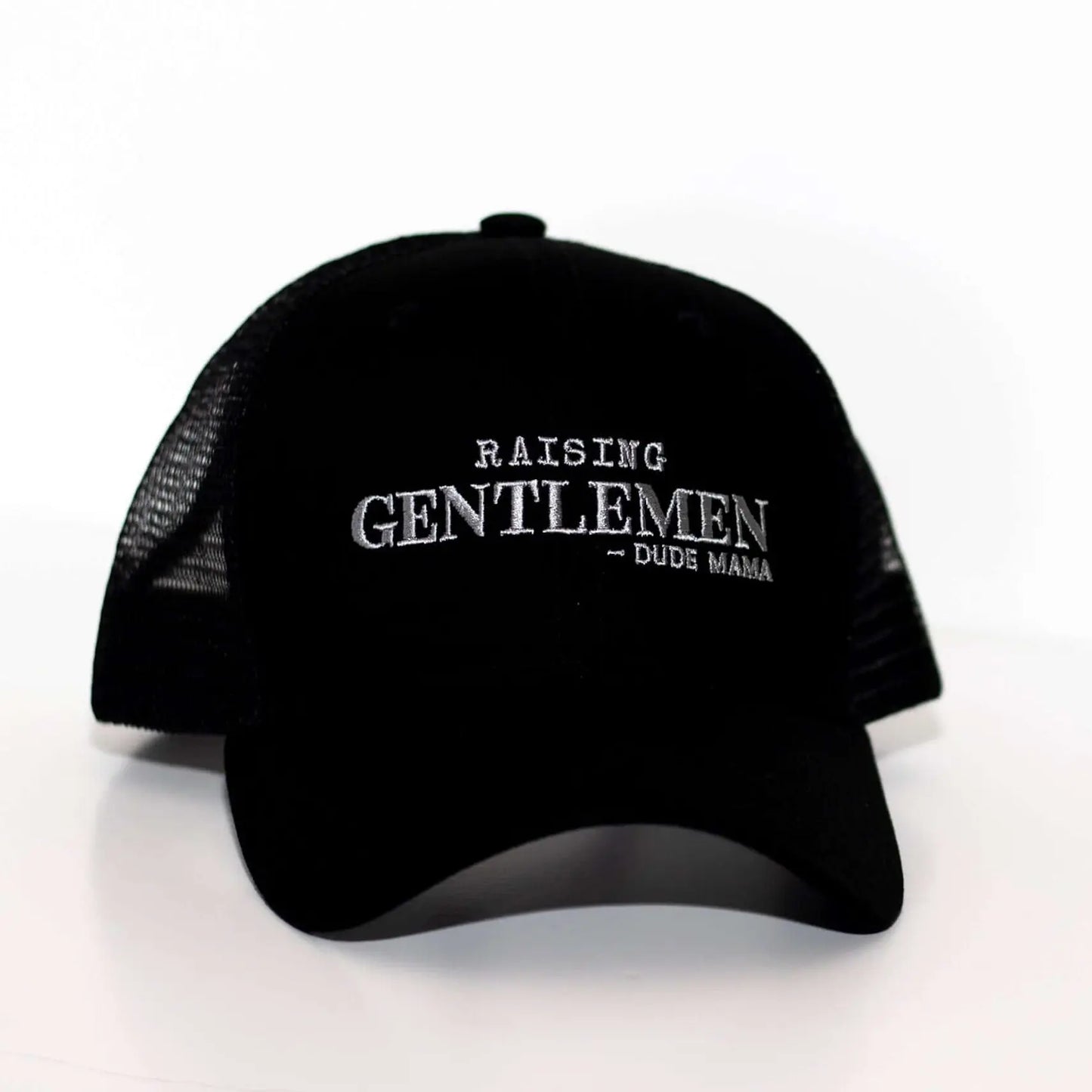 Raising Gentlemen Boy Mama Hat featuring black fabric and embroidered.