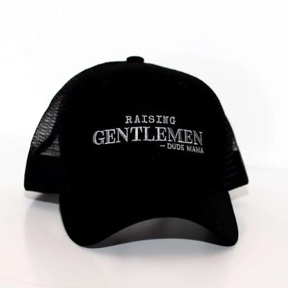 Raising Gentlemen Boy Mama Hat featuring black fabric and embroidered.